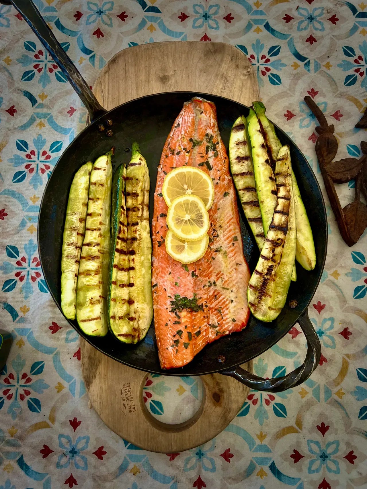 Grilled salmon fillet with lemon and herbs